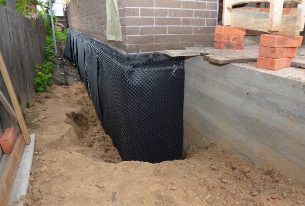 SJ Waterproofing Pros technician performing targeted Waterproofing assessment in Sharpsburg, PA